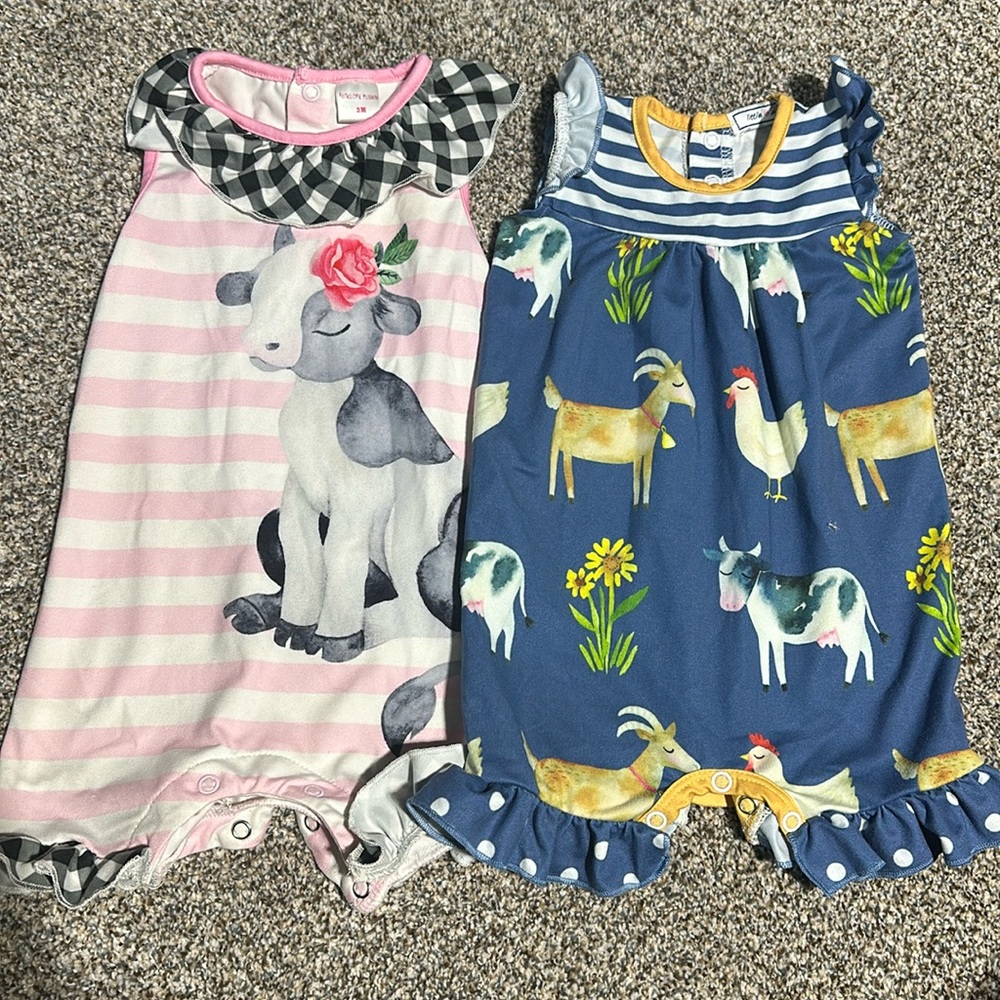 Bundle of 2 baby girl rompers, pink with cows and blue with farm